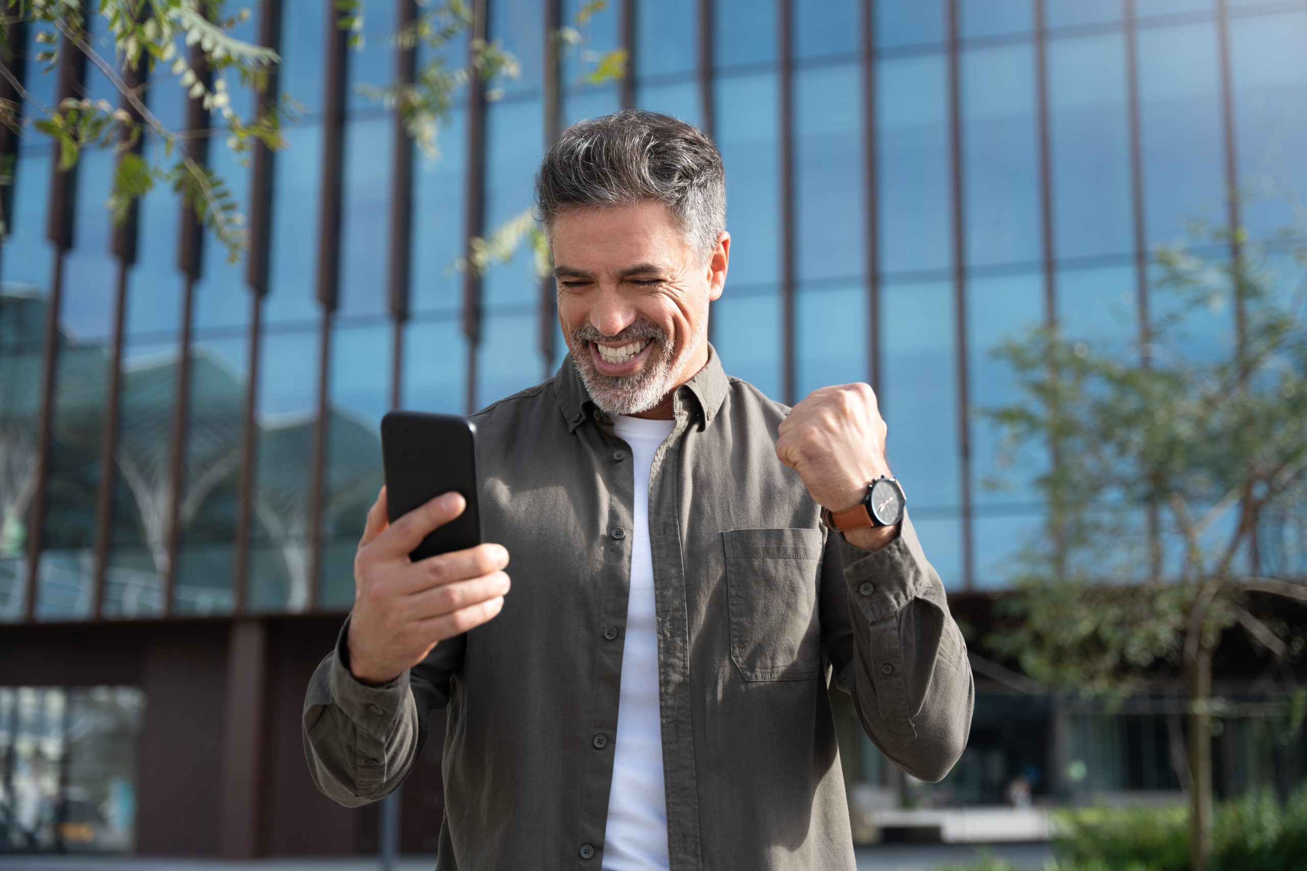 Happy,Delighted,Satisfied,Business,Man,Looking,Smartphone,Mobile,Phone,Gesturing Happy,Delighted,Satisfied,Business,Man,Looking,Smartphone,Mobile,Phone,Gesturing