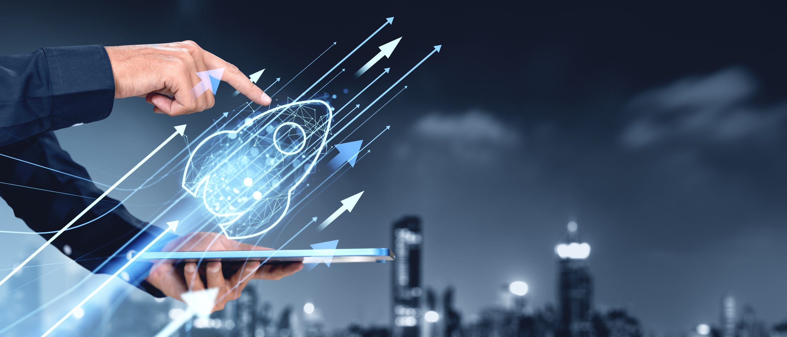 Businessman,Touching,Rocket,Icon,Hologram,On,A,Tablet,,Cityscape,Background, Businessman,Touching,Rocket,Icon,Hologram,On,A,Tablet,,Cityscape,Background,